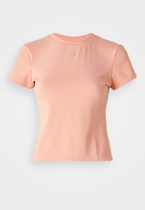 Light pink, short-sleeved t-shirt made of ribbed fabric. Features a round neckline and a small embossed logo at the center.