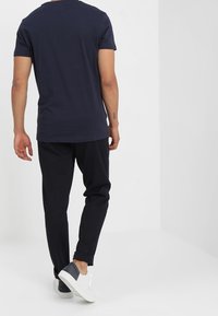 Calvin Klein Jeans Triko s potiskem - dark blue
