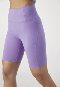Girlfriend Collective BIKE SHORTS - Tajice - cosmos