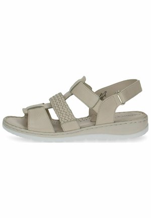 Beige sandal with woven straps, open toe design, adjustable back strap, flat sole, and textured footbed for comfort.