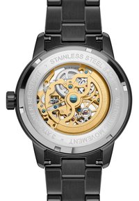 Sorte rustfritt stålklocke med gjennomsiktig bakdeksel som avslører gullfargede gir og blå aksenter. Inskripsjonen inkluderer "rustfritt stålbak" og "automatisk bevegelse."