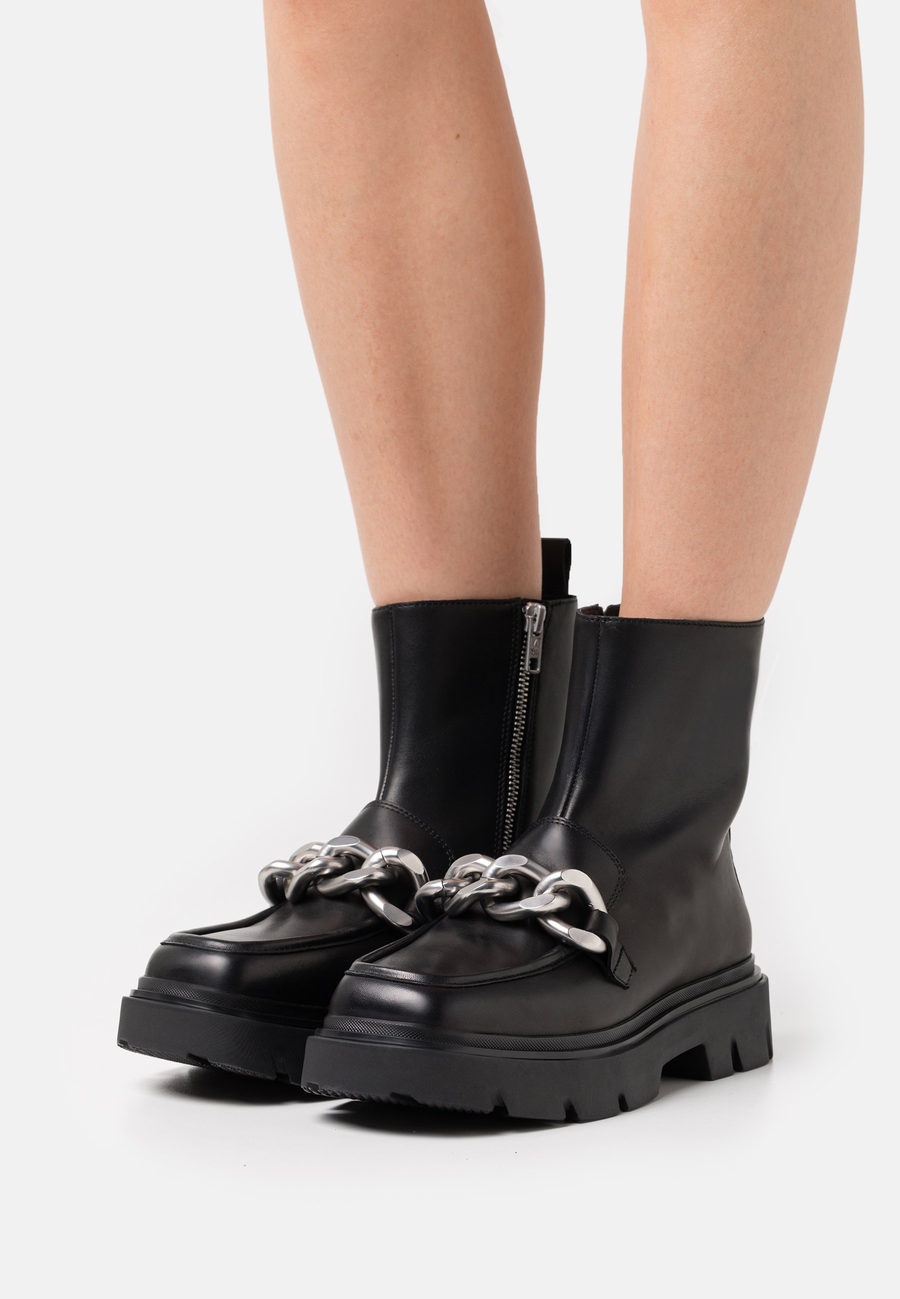 silver platform ankle boots