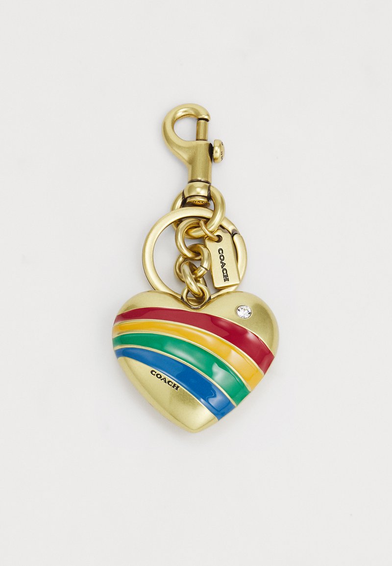 Heart-shaped keychain in gold metal, featuring multicolored enamel stripes (red, yellow, green, blue) and a small crystal accent.