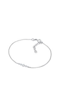 Bracciale in argento con cinque gemme trasparenti di dimensioni gradualmente crescenti. Chiusura regolabile con catena aggiuntiva.