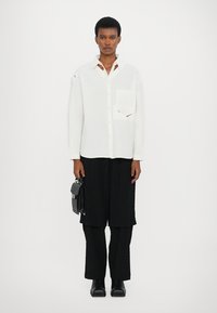Henrik Vibskov SHANTS PANTS - Trousers - black
