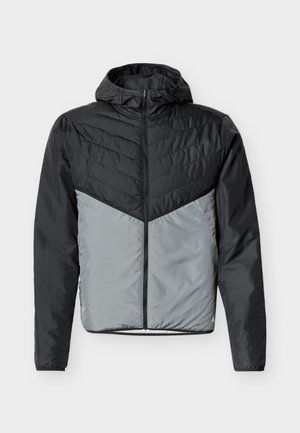 Black and gray lightweight hooded jacket with full front zipper and long sleeves, featuring chevron stitching on the upper chest area.