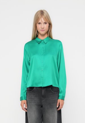 Satin green button-up shirt with a collar, long sleeves, and a cropped design. Smooth texture, featuring a relaxed fit and subtle sheen.