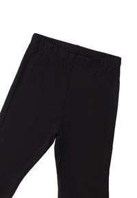 Leggings neri realizzati in tessuto elasticizzato, con una vita elastica e una superficie liscia, progettati per il comfort e la facilità di movimento.