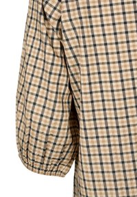 Chemise à carreaux marron et noire avec manches bouffantes, en tissu léger, dotée de poignets élastiqués et d'une coupe décontractée.