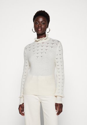 Heller Creme-Pullover mit strukturiertem Strickmuster, Rüschenausschnitt und langen, engen Ärmeln. Weiches, leichtes Material.