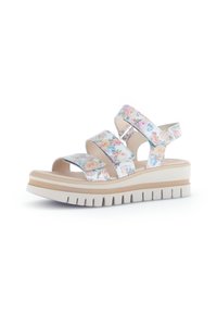 Floral-patterned, white synthetic sandals with three adjustable straps, a beige platform sole, and ribbed traction for stability.