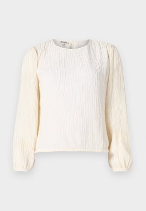 Witte, textuurrijke blouse met lange puffmouwen. Beschikt over een ronde halslijn en een ontspannen pasvorm. Gemaakt van lichte, vloeiende stof.