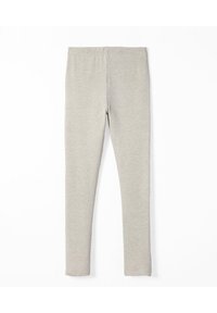 Leggings grigi in morbido e elasticizzato. Design aderente con una vita liscia e senza cuciture visibili, per un aspetto senza soluzione di continuità.