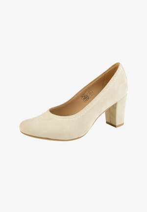 Beige suède pumps voor dames met gesloten neus, blokhak, glad bovendeel en gestikte bies langs de opening.