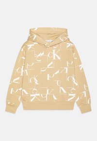 Felpa beige con stampa geometrica di testo bianco ripetuto, dotata di una spaziosa tasca frontale e cappuccio regolabile con cordino.