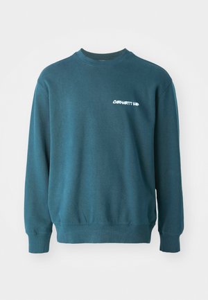 Tamnozelena dukserica od mješavine pamuka. Ima rebraste manžete i donji rub, s bijelim "Carhartt WIP" logotipom na lijevoj strani prsa. Jednostavan dizajn.