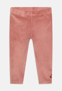 Leggings in velluto rosa con una texture liscia, dotati di un accento con logo nella parte inferiore della gamba. Progettati per un look aderente, con una vita elasticizzata.
