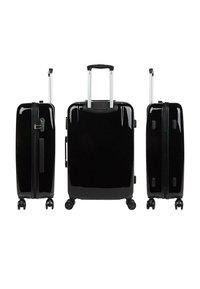 Juego de maletas rígidas negras que incluye tres tamaños, textura lisa, asas retráctiles y cuatro ruedas giratorias para una fácil maniobrabilidad.