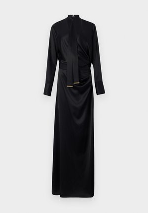 Abito lungo in satin nero con maniche lunghe, colletto alto e dettaglio in vita annodato. Presenta una texture liscia e sottili accenti dorati alla fine delle maniche.