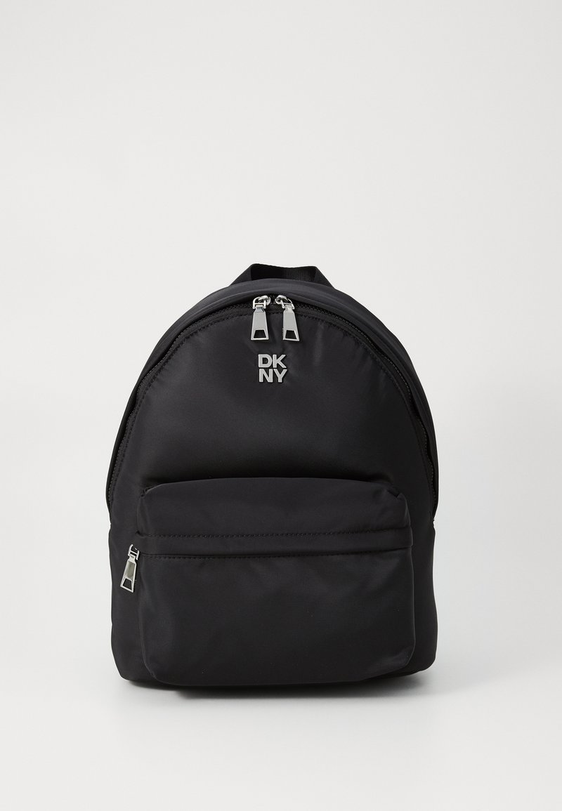 Black nylon backpack with a rounded shape, featuring a top zip closure, front zipper pocket, and silver hardware accents. Logo displayed on front.