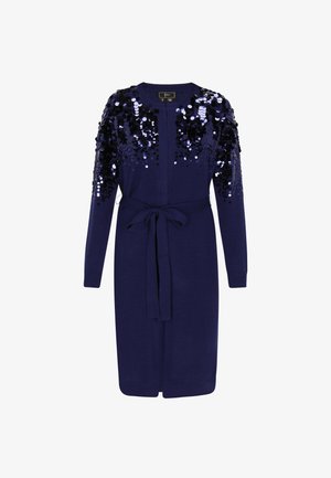 Long cardigan navy avec ceinture à nouer sur le devant et des paillettes noires et bleues brillantes décorant densément les épaules et les manches supérieures.