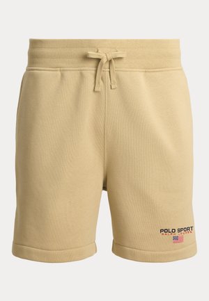 Shorts beige en mélange de coton avec une taille élastique, un cordon de serrage, des revers retroussés, et un logo brodé "POLO SPORT" sur la jambe gauche.
