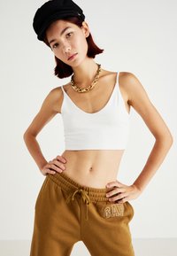 GAP HERITAGE JOGGER - Pantalones deportivos - palomino brown global