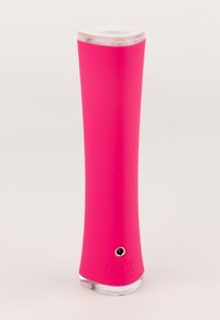 Pink silicone product with a smooth, tapered design, featuring a clear top and a small audio port at the base. CE marked on the side.