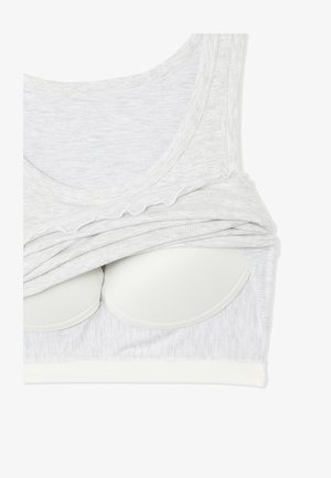 Canotta per allattamento in tessuto grigio chiaro a costine con coppe del reggiseno imbottite integrate, parzialmente sollevata per mostrare la struttura interna del reggiseno.