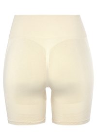 Beige modelerende shorts met een brede geribbelde tailleband, een gladde pasvorm, lengte tot halverwege de bovenbenen en naadloze randen voor comfort.