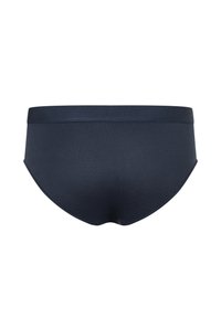 Slip da donna blu scuro con una consistenza liscia, cintura elastica e design a taglio classico, con un retro senza cuciture.