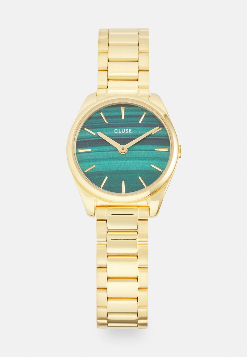 Gouden horloge met een turquoise gestreepte wijzerplaat, met een metalen afwerking en een schakelarmbandontwerp. Minimalistische uurmarkeringen en wijzers.
