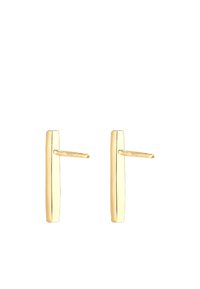 Pendientes de barra en tono dorado con un diseño minimalista que presentan una forma de barra recta y una pequeña tuerca para un ajuste seguro. Textura de superficie suave.