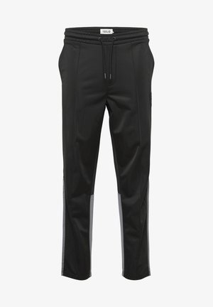 Zwarte sportbroek met een elastische tailleband, trekkoordsluiting en grijze zijpanelen. Gladde stof met een ontspannen pasvorm en taps toelopende benen.