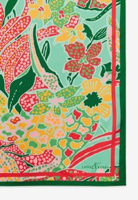 Écharpe florale présentant des motifs vibrants en rouge, rose, jaune et vert sur un fond menthe, avec une bordure verte contrastante.