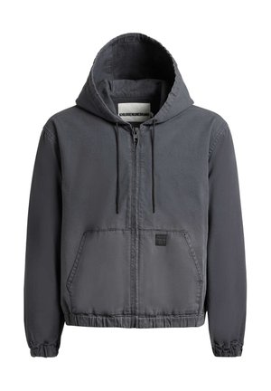 Tmavosivá mikina na zips s kapucňou so šnúrkou, kapsou na prednej strane, elastickými manžetami a lemom a malou značkovou nášivkou na vrecku.