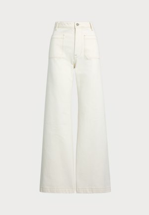 Jeans large en denim écru. Design taille haute avec une fermeture à bouton, deux poches avant et des détails de surpiqûres contrastantes.