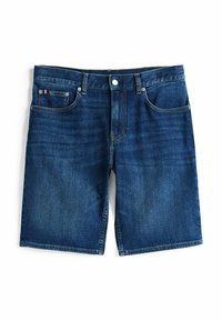 Berci in denim di un blu scuro con taglio dritto, dotati di cinque tasche, chiusura a bottone e leggere sfumature, con dettagli di cucitura arancione.