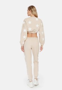 Cardio Bunny Tracksuit bottoms - beige