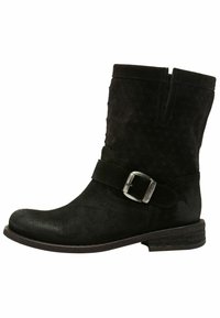Black suede ankle boot with a rounded toe, side stitching, a wide strap with a silver buckle, and a low stacked heel.