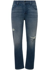 Sininen farkkutakki suoran leikkauksen kanssa, jossa on kuluneita repeämiä reidessä ja hienovaraista haalistumista. Klassinen viiden taskun muotoilu, hopeinen napitus.