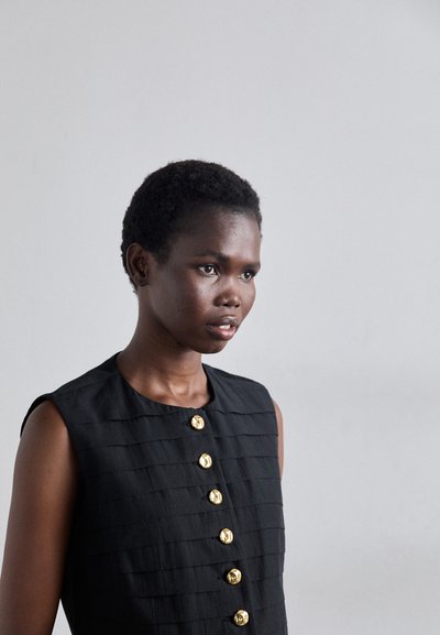 sandro HAUT - Waistcoat - noir