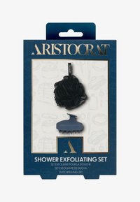 Bruseskrubsæt med en sort loofah og en blå, tekstureret skrubber. Emballagen er mørkeblå med gulddetaljer og illustrationer.