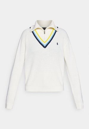 Suéter blanco de punto con cuello con cremallera. Presenta un diseño de cuello en V con rayas azules, amarillas y marino. Logo bordado en el pecho.