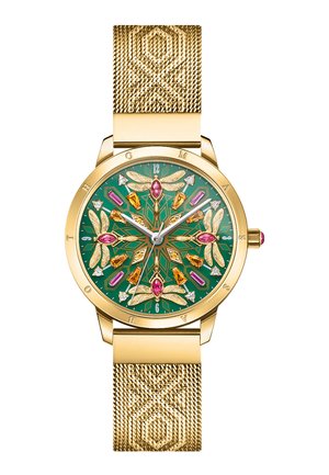 Gold wristwatch with a textured band, green face, and dragonfly and gemstone motifs in pink, gold, and white on the dial.