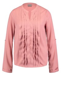 Blouse rose à manches longues en tissu lisse avec plis verticaux et col rond. Les poignets sont retroussés avec des boutons en décoration.