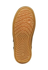 Suola di scarpa in gomma con superficie testurizzata caratterizzata da motivi circolari e scanalature. Il colore è arancione con un logo grigio e indicatore di taglia.