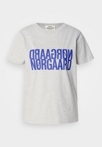 Grey cotton t-shirt featuring large, bold blue text reading "NØRGAARD" displayed vertically and horizontally. Round neckline, short sleeves.