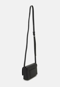 Calvin Klein Taška s příčným popruhem - black