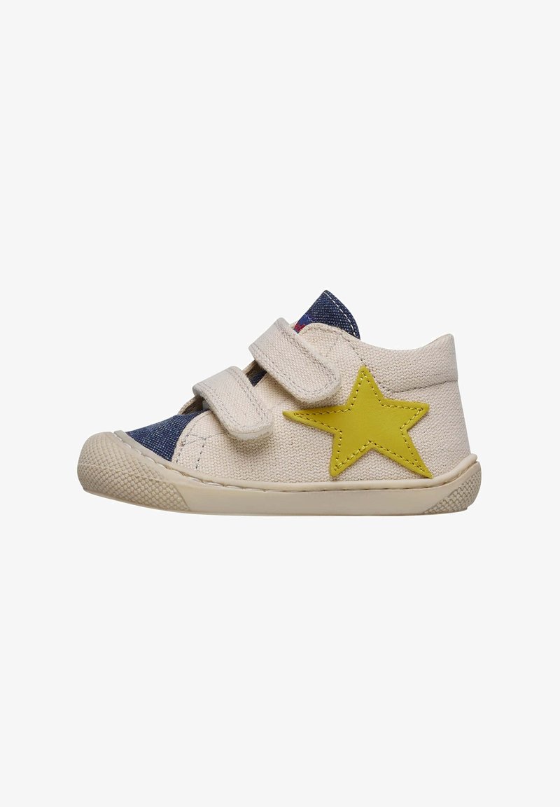 Canvas children's shoes with a light beige upper, blue denim accents, yellow star appliqué, and two Velcro straps for fastening.